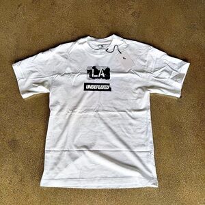 Nike White Short Sleeve Graphic T-Shirt with Black LA Undefeated Print